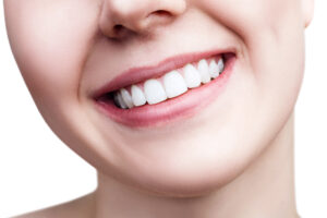 Woman with healthy teeth and smile. Healthy smile concept.